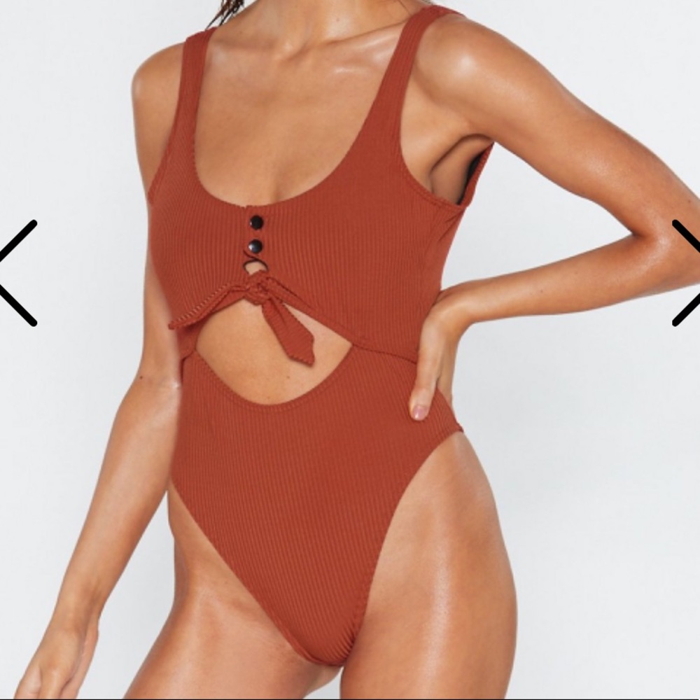 Orange cut-out one piece, nwot, size 2